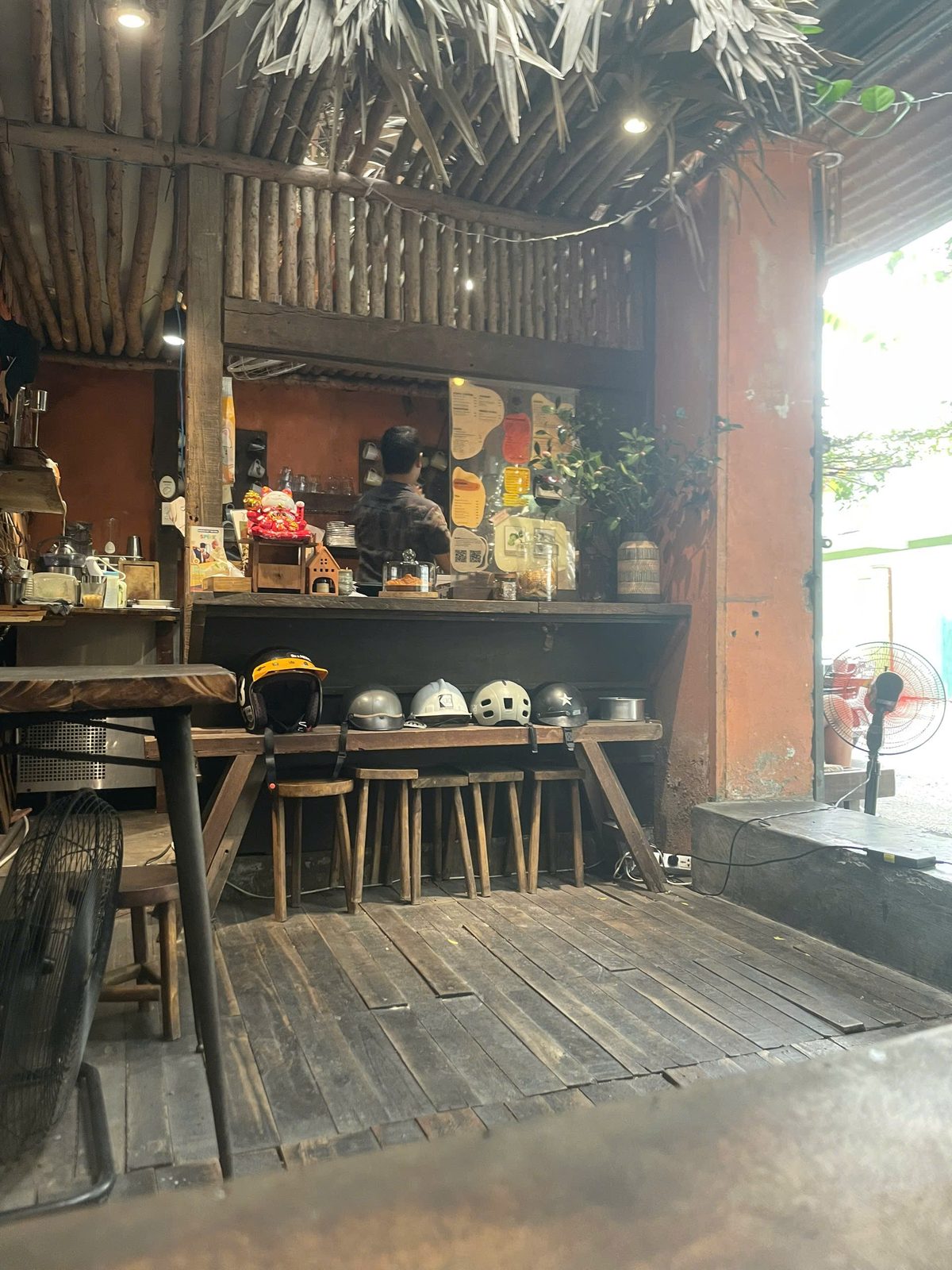 Inside — helmets lined on the long bench