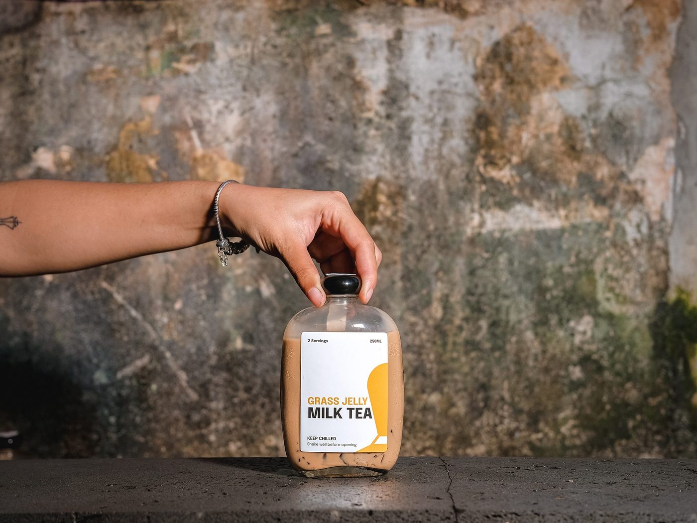 Coffee education content; bottle street shots, candid customers