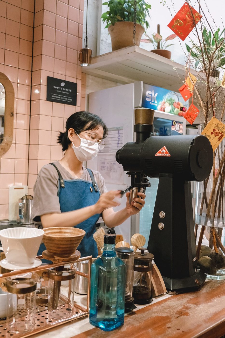 Largest month; Tết street atmosphere, vine facade, serving trays