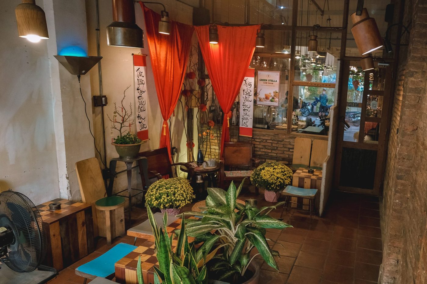 Largest month; Tết street atmosphere, vine facade, serving trays