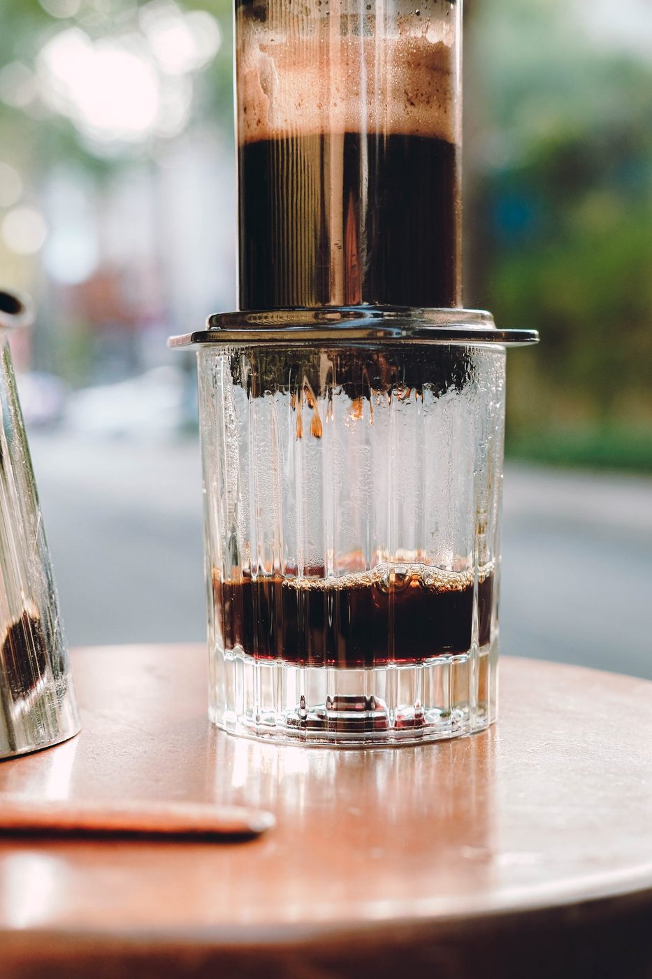 AeroPress focus; first food (panna cotta), single-origin bags