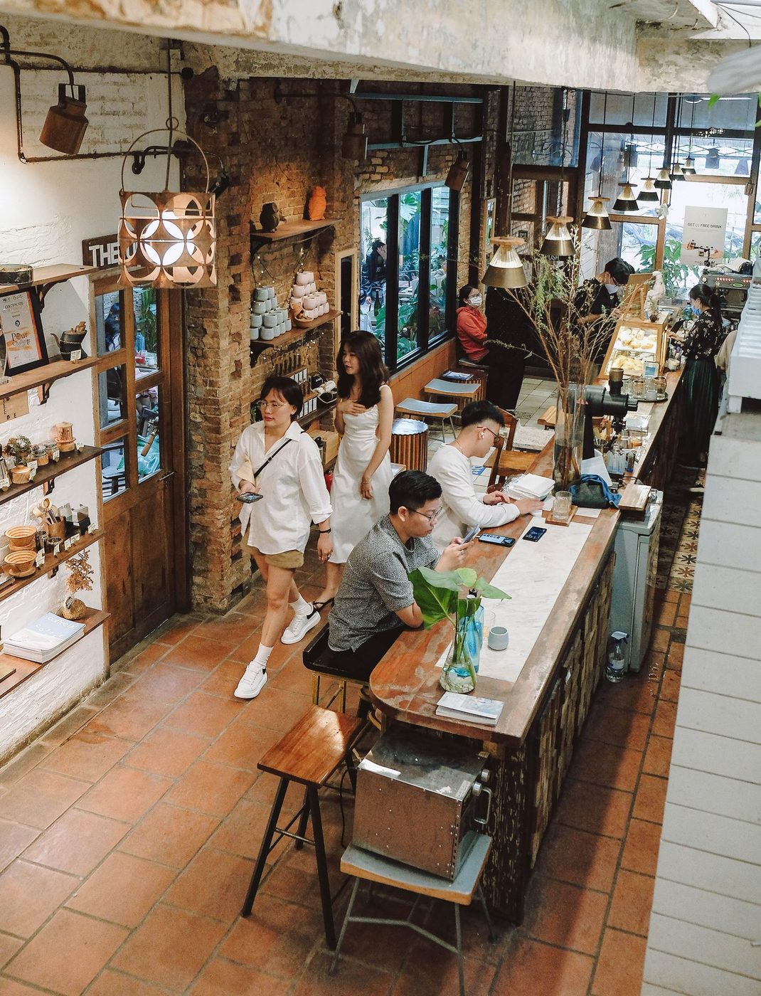 Lush garden; vine-covered exterior, courtyard interior, candid customers