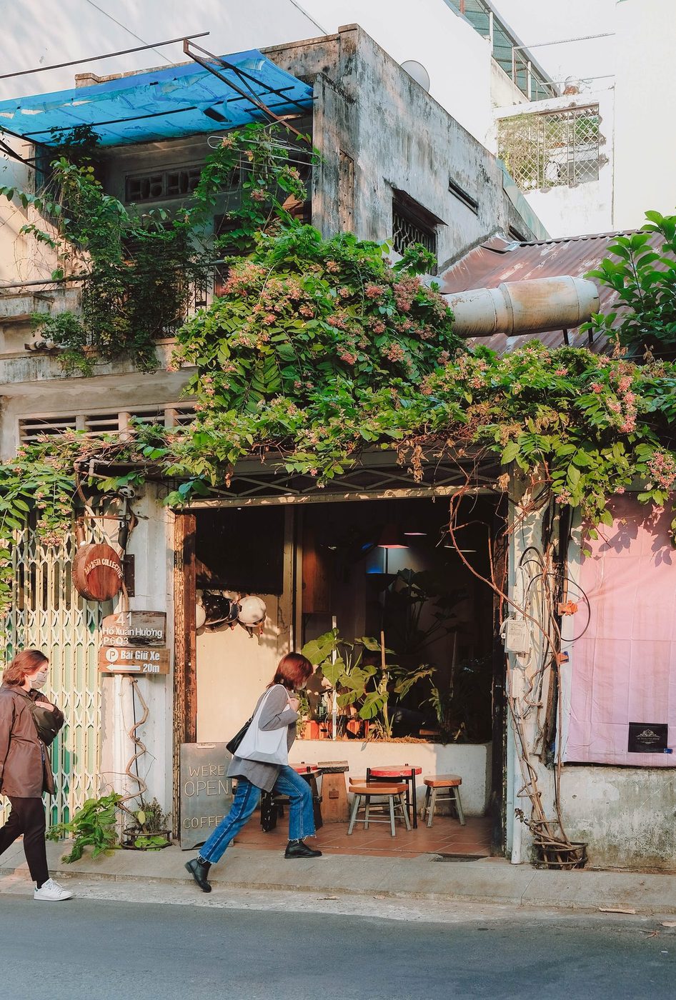 Lush garden; vine-covered exterior, courtyard interior, candid customers