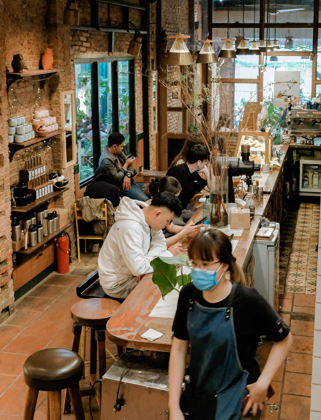 Lush garden; vine-covered exterior, courtyard interior, candid customers