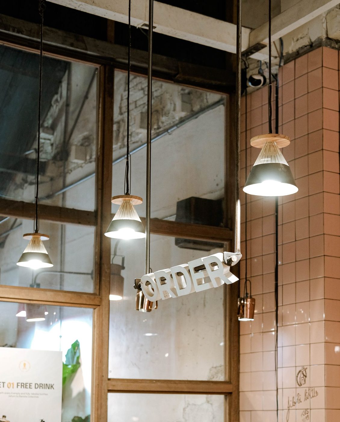 Leaf-framed drinks, behind-bar candids, educational branding