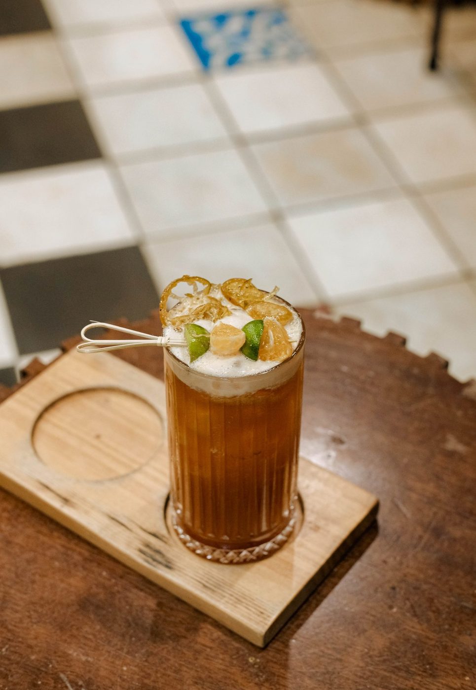 Leaf-framed drinks, behind-bar candids, educational branding