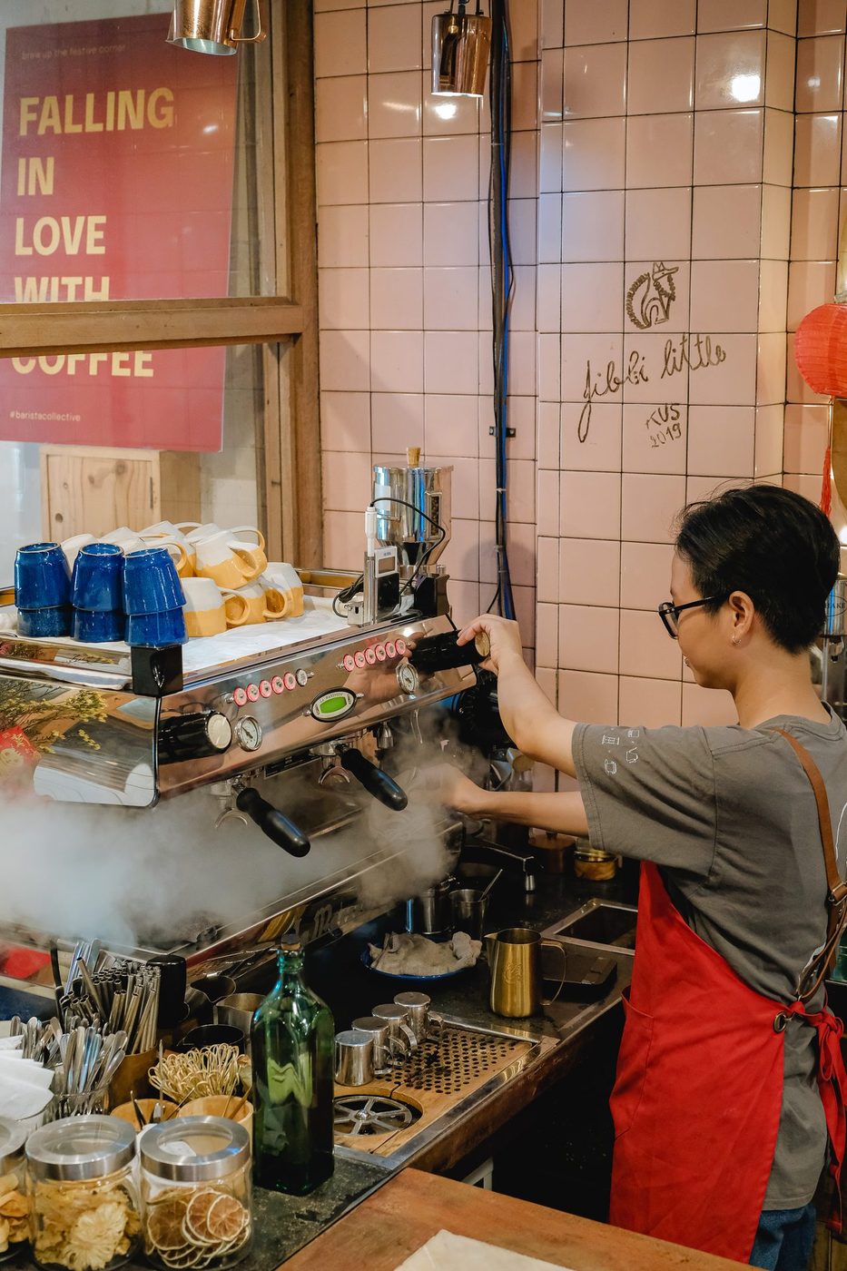 Tết 2023; gift sets, coffee tubes, chrysanthemum decor, red apron barista