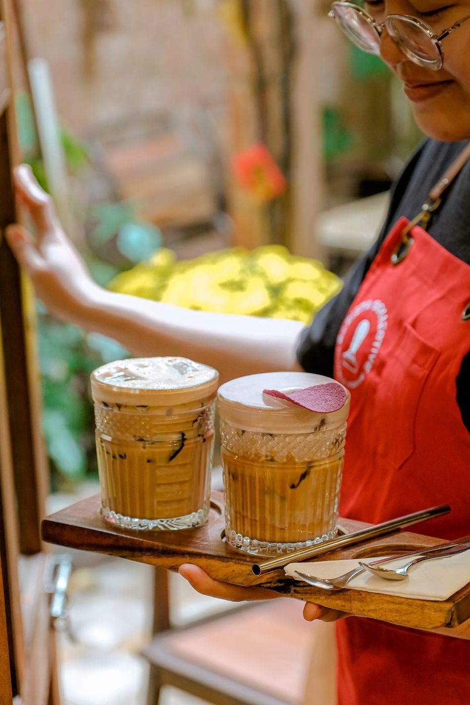 Tết 2023; gift sets, coffee tubes, chrysanthemum decor, red apron barista