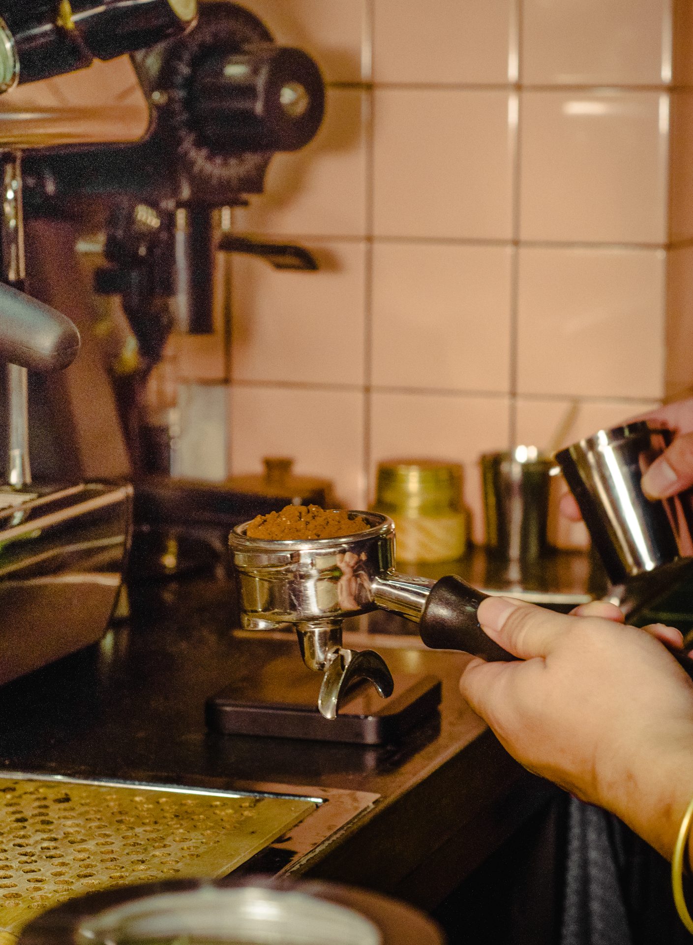 Dosing the espresso.