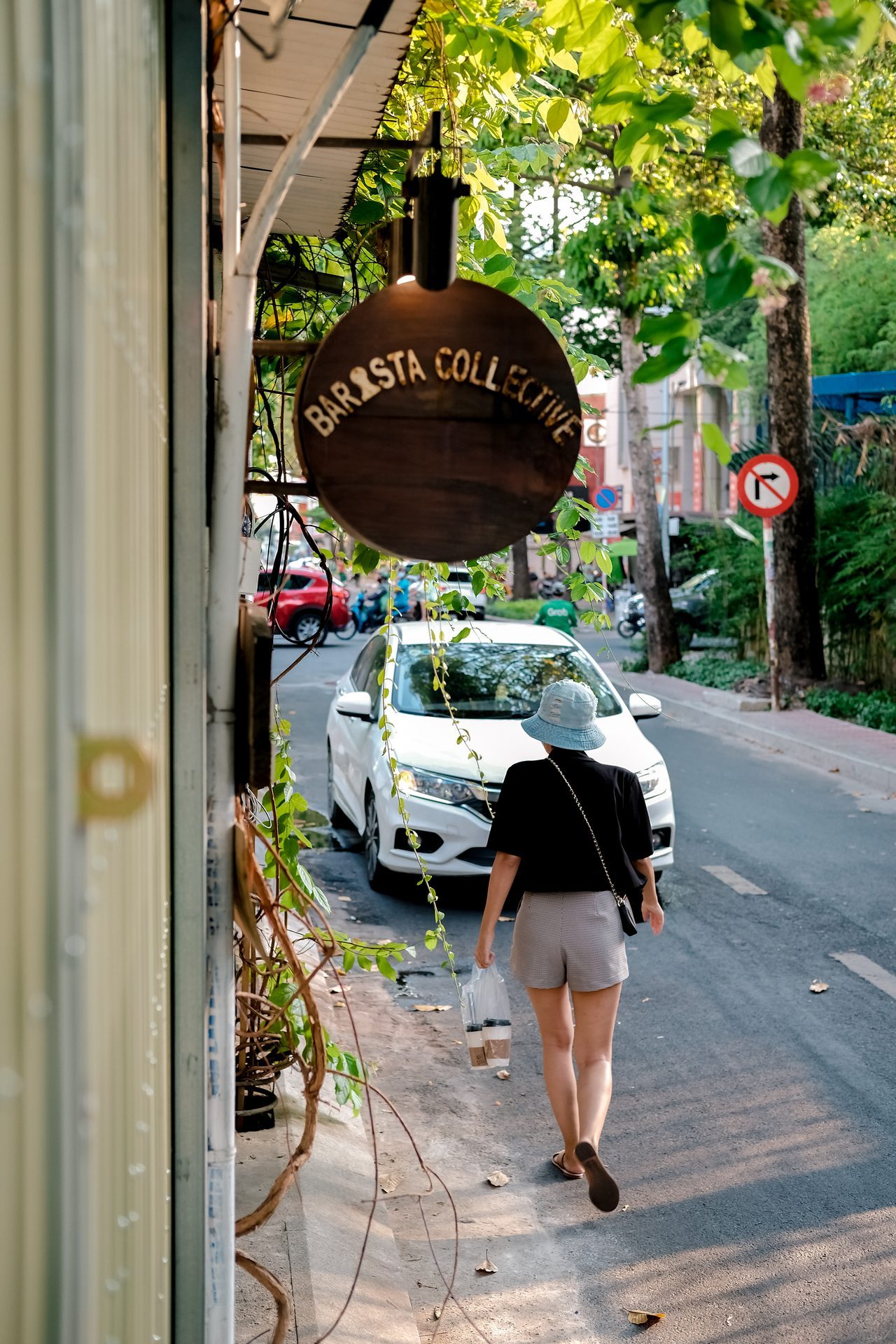 Our sign, swinging over the lane.