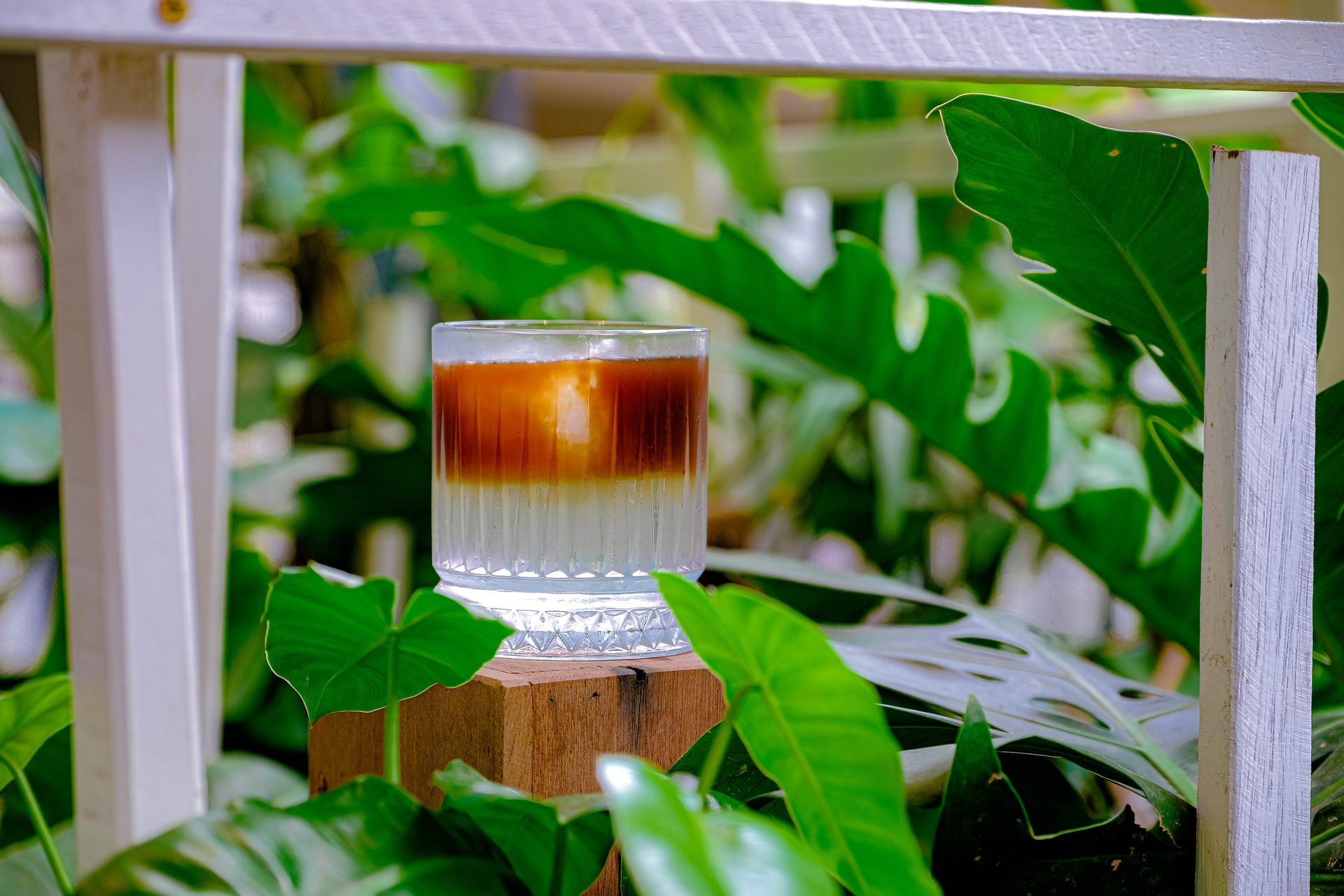 Crystal glass among the foliage.