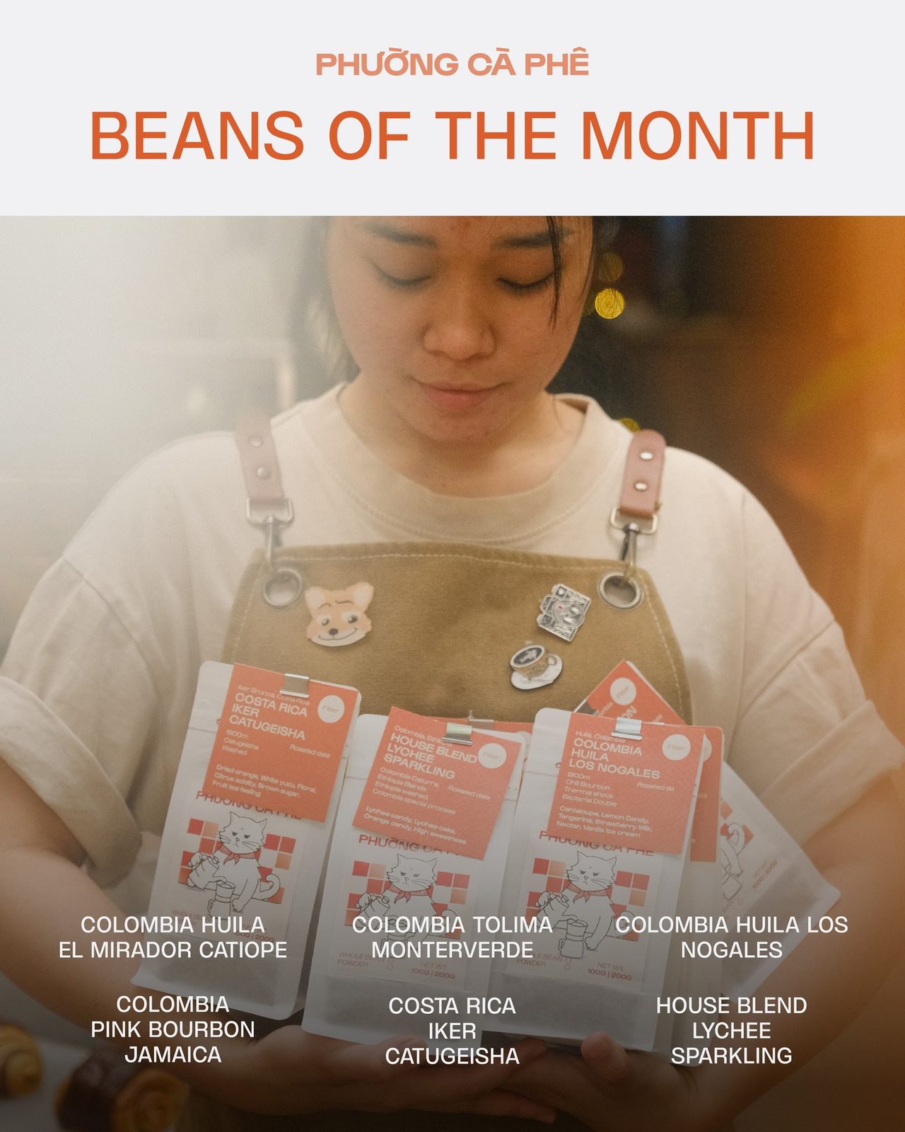 A Phường barista holding origin bags