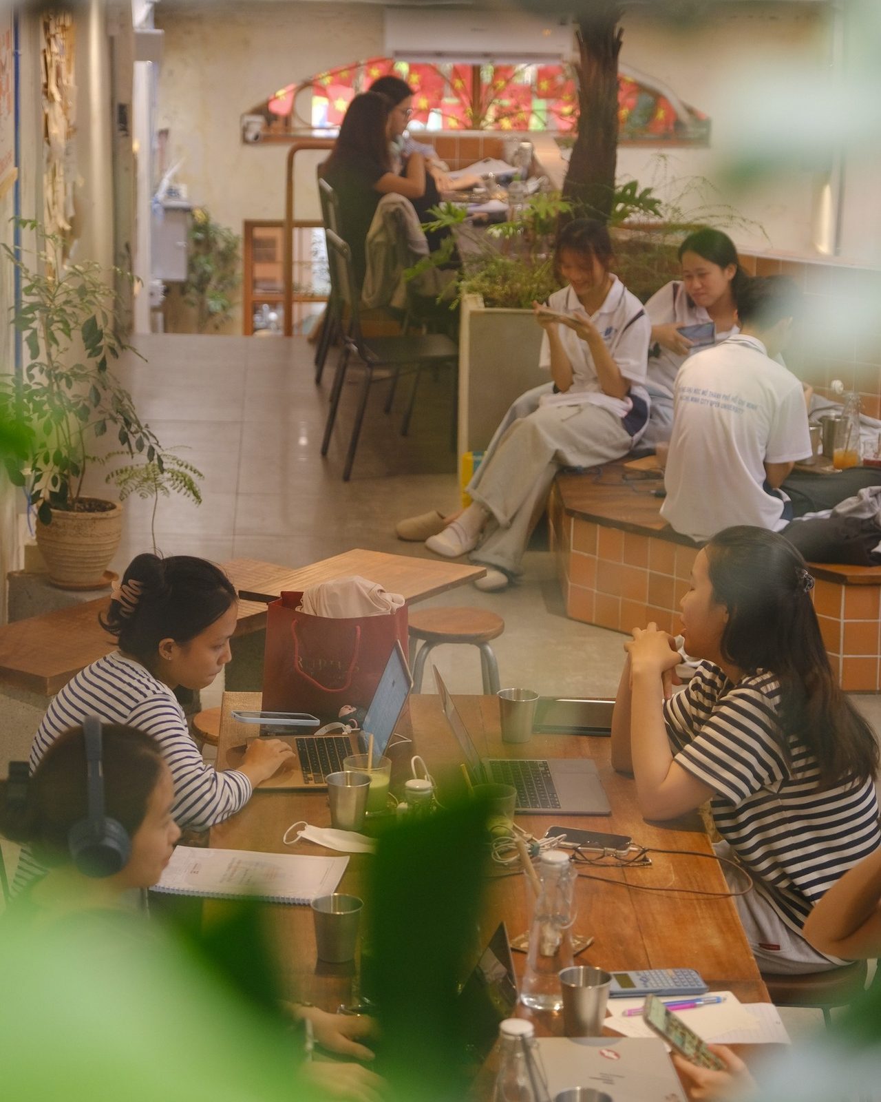 Workdate — laptops and coffee on the communal table