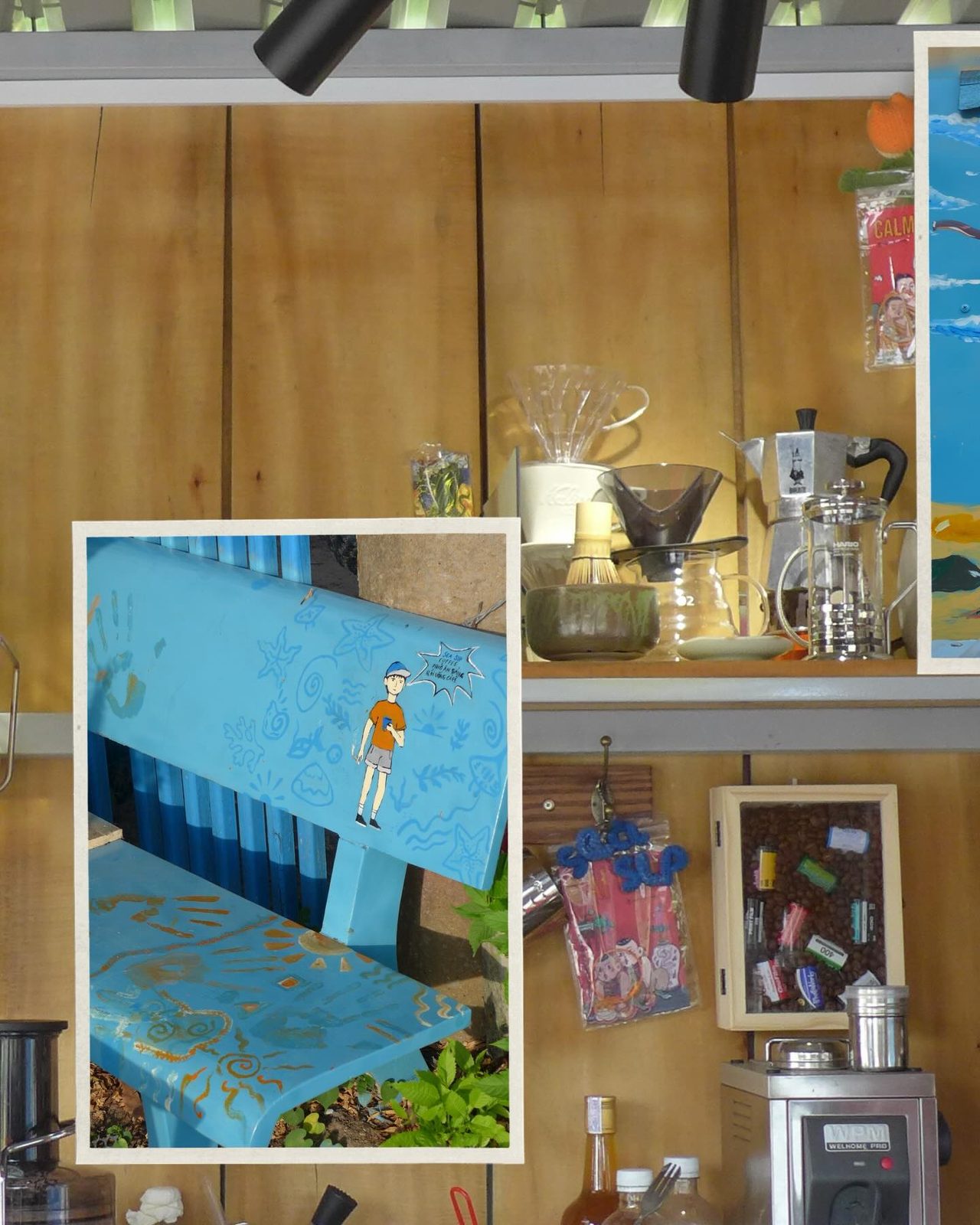 Interior shelving with brewing gear and a blue mural inset