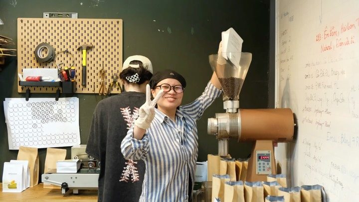 Barista at the grinder