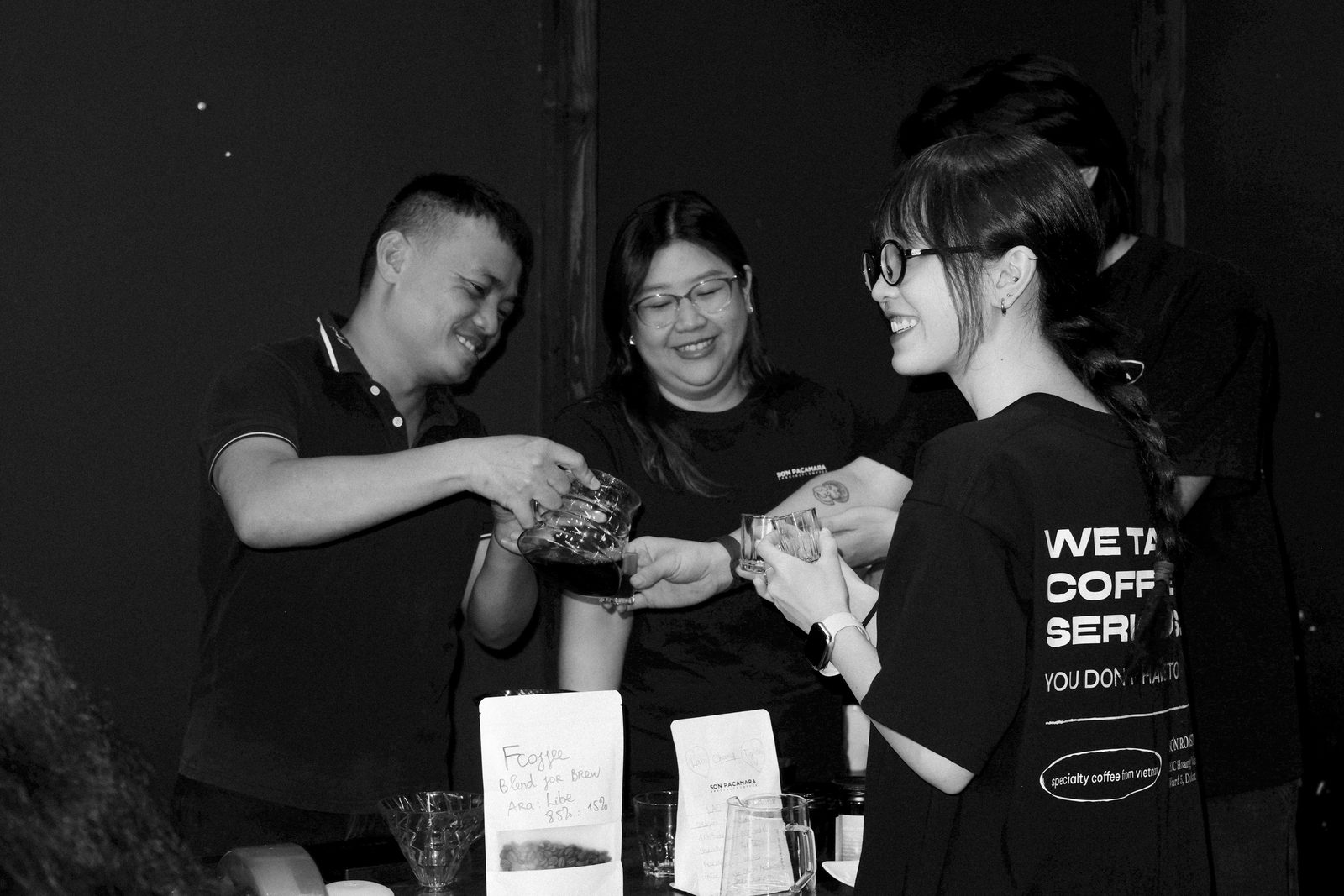 A cupping session, black and white