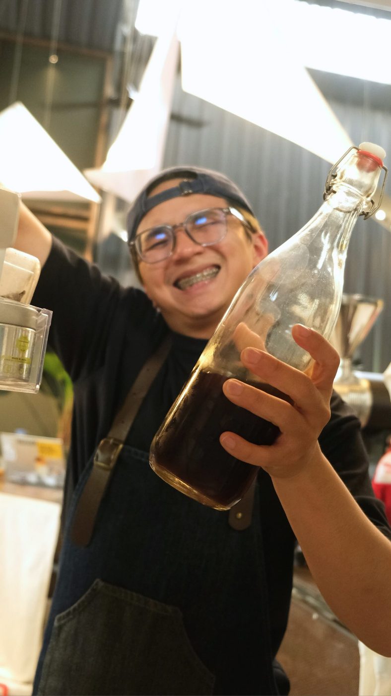 A cold brew bottle taken down to the stream